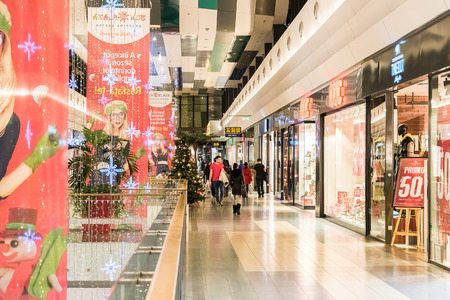BUCHAREST, ROMANIA - DECEMBER 24, 2014: People Shopping For Christmas In Luxury Shopping Mall Interior.のeditorial素材