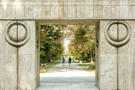 TARGU JIU, ROMANIA - AUGUST 26, 2014: The Gate of the Kiss is a stone sculpture made by Constantin Brancusi in 1938 and symbolizes the triumph of life over death.のeditorial素材