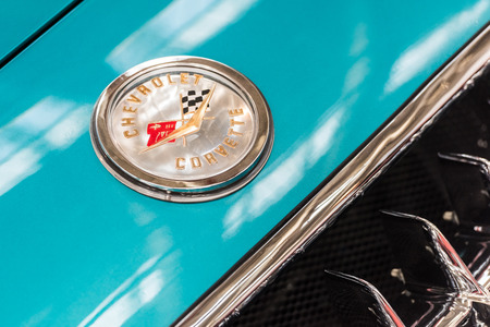 BUCHAREST, ROMANIA - OCTOBER 31, 2014: 1959 Chevrolet Corvette Car Sign. From 1953 the Corvette is a sports car manufactured by Chevrolet division of American automotive conglomerate General Motors.のeditorial素材