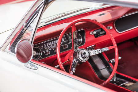 BUCHAREST, ROMANIA - OCTOBER 31, 2014: 1967 Ford Mustang Car Interior. The Ford Mustang is an automobile manufactured by the Ford Motor Company and was introduced on April 17, 1964.のeditorial素材
