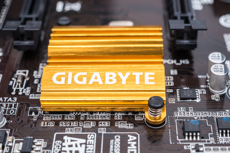 BUCHAREST, ROMANIA - FEBRUARY 01, 2015: Gigabyte Chipset Heatsink On Motherboard. Gigabyte is an international manufacturer of computer hardware products, best known for award-winning motherboards.のeditorial素材