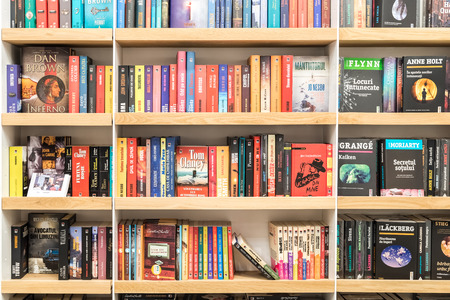 BUCHAREST, ROMANIA - FEBRUARY 13, 2015: Famous Books For Sale On Library Shelf.のeditorial素材