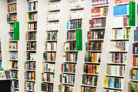 BUCHAREST, ROMANIA - JANUARY 23, 2015: Famous Books For Sale On Library Shelf.のeditorial素材