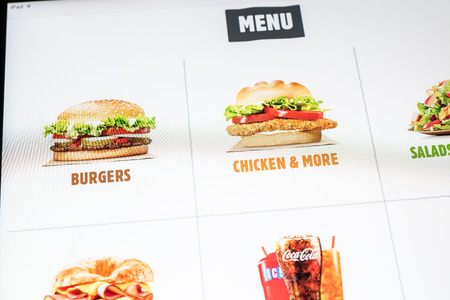 BUCHAREST, ROMANIA - JANUARY 24, 2015: Fast Food Website On Apple iPad Air Tablet.のeditorial素材