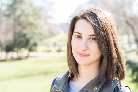 Beautiful Smiling Girl Portrait In Autumn Park