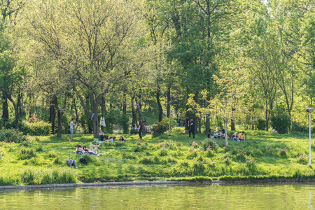 BUCHAREST ROMANIA  MAY 08 2015: People Having Picnic And Playing Games In Carol Public Park On Spring Day.のeditorial素材