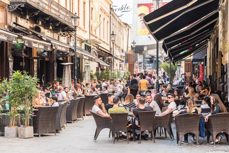BUCHAREST ROMANIA  MAY 17 2015: People Enjoy Spring Time Downtown Lipscani Street One Of The Most Busiest Streets Of Bucharest.のeditorial素材