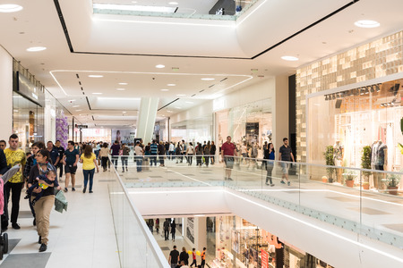 BUCHAREST ROMANIA  JUNE 01 2015: People Crowd Shopping In Luxury Mall Interior.