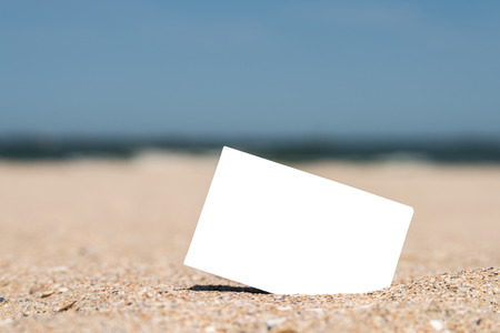 White Blank Instant Photo Card On Beach Sand In Summerの写真素材