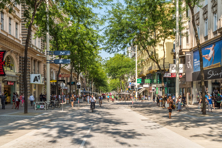 VIENNA, AUSTRIA - AUGUST 08, 2015: People Shopping On Mariahilferstrasse The Largest And One Of The Most Popular Shopping Streets Of Vienna.のeditorial素材