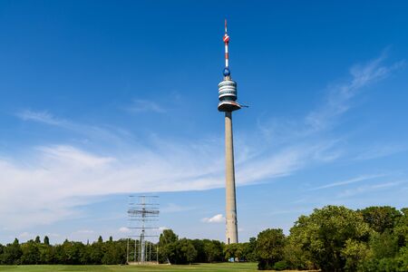 VIENNA, AUSTRIA - AUGUST 20, 2015: The Vienna Donauturm Danube Tower, opened in April 1964, is the tallest structure in Austria, at 252 metres and among the 75 tallest towers in the world.のeditorial素材
