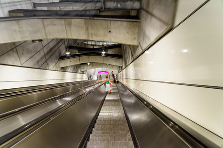 VIENNA, AUSTRIA - AUGUST 28, 2015: People Traveling On Escalator To Train Subway Station In Downtown...