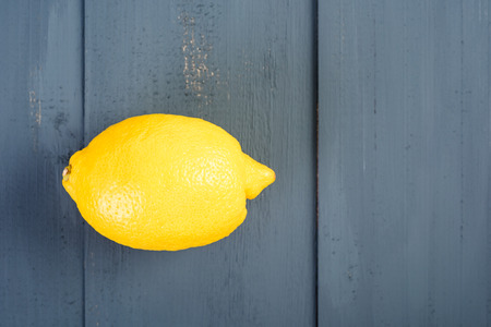 Fresh Yellow Lemon On Wood Table