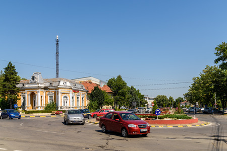 TECUCI, ROMANIA - JULY 24, 2015: High Traffic On Main Street Of Tecuci City In Galati County.のeditorial素材