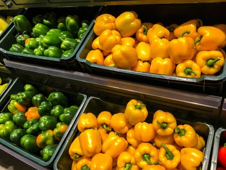Colored Capsicum In Vegetable Market Displayのeditorial素材