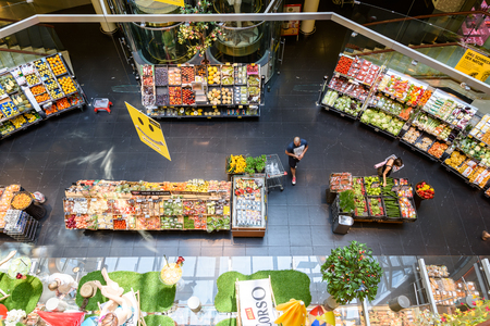VIENNA, AUSTRIA - AUGUST 08, 2015: People Shopping For Grocery Food In Supermarket Store Aisle.のeditorial素材