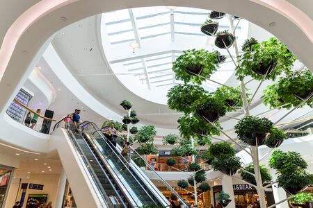 VIENNA, AUSTRIA - AUGUST 10, 2015: People Shop In Vienna Shopping City Luxury Mall.のeditorial素材