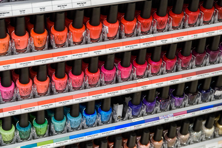 VIENNA, AUSTRIA - AUGUST 12, 2015: Woman Nail Polish Products For Sale In Cosmetics Shop.のeditorial素材