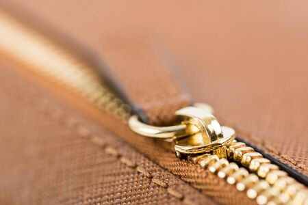 Zipper Closeup On Brown Leather Walletの写真素材