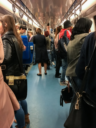 BUCHAREST, ROMANIA - APRIL 13, 2016: People Travel By Subway Train In Downtown Bucharest.