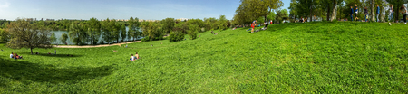 BUCHAREST , ROMANIA - APRIL 17, 2016: Panorama View Of People Relaxing And Having Picnic In Youths Public Park (Parcul Tineretului) In Bucharest In First Days Of Spring.のeditorial素材