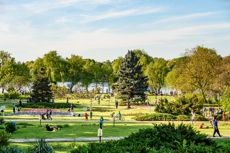 BUCHAREST, ROMANIA - APRIL 16, 2016: People Having Fun In Herastrau Public Park On Spring Day.のeditorial素材