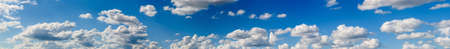 Panorama Landscape Of White Cumulus Clouds On Blue Skyの写真素材