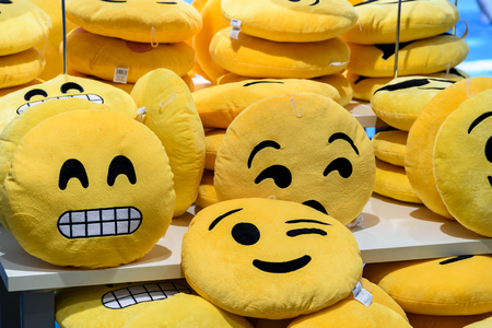 VALENCIA, SPAIN - JULY 20, 2016: Smiley Face Pillows For Sale In Entertainment Store.のeditorial素材