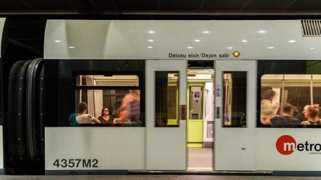 VALENCIA, SPAIN - JULY 20, 2016: People Travel By Subway Train In Downtown Valencia City.