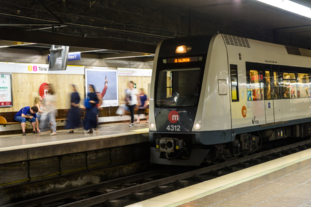 VALENCIA, SPAIN - JULY 21, 2016: People Travel By Subway Train In Downtown Valencia City.のeditorial素材