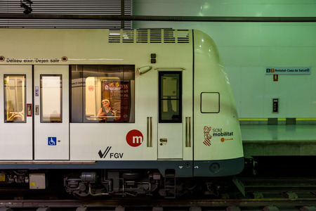 VALENCIA, SPAIN - JULY 21, 2016: People Travel By Subway Train In Downtown Valencia City.のeditorial素材