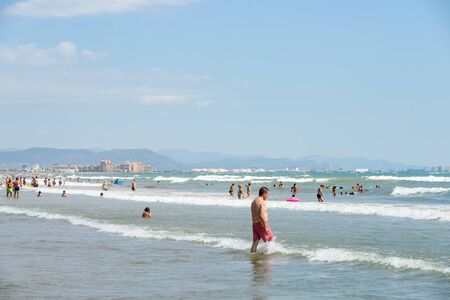 VALENCIA, SPAIN - JULY 23,  2016: People Have Fun At Balearic Sea On Valencia Beach In Summer.のeditorial素材