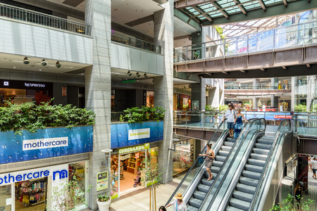 VALENCIA, SPAIN - JULY 25, 2016: People Looking For Summer Sales In Shopping Luxury Mall Interior.のeditorial素材