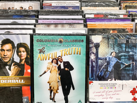 BUCHAREST, ROMANIA - SEPTEMBER 20, 2016: Classic And New Hollywood Production Movies On Dvd For Sale In Entertainment Center.のeditorial素材