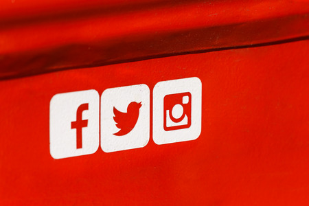 BUCHAREST, ROMANIA - SEPTEMBER 11, 2016: Facebook, Twitter and Instagram Social Media Icons on Red Metal Background.のeditorial素材