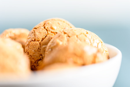 Italian Amaretti Biscuits In White Bowlの写真素材