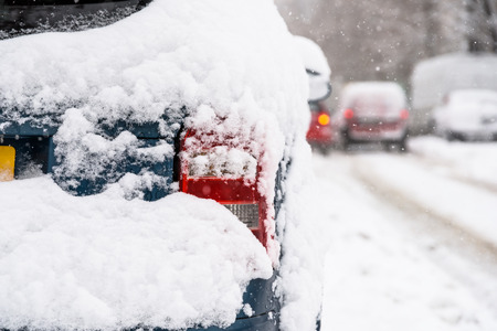 Cars Covered With Fresh White Snow After A Heavy Blizzard In Bucharest Cityの写真素材