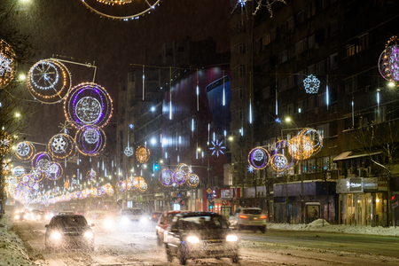 BUCHAREST, ROMANIA - JANUARY 08, 2017: Hard Traffic During Winter Snow Storm In Downtown Bucharest City.のeditorial素材