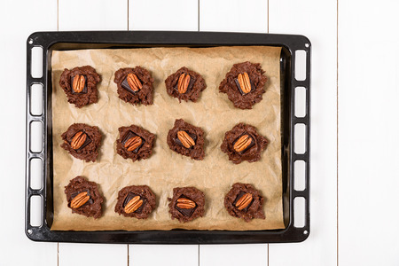 Setting Pecan Chocolate Cookies In Tray Before Cooking In Ovenの写真素材