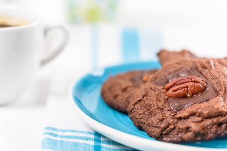 Pecan Chocolate Cookies And Coffee Breakfastの写真素材