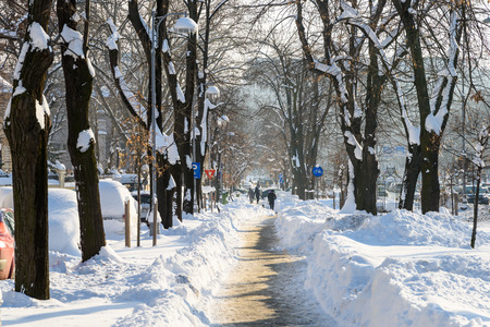 BUCHAREST, ROMANIA - JANUARY 12, 2017: People Enjoying Sunny Winter Day Following A Strong Snow Storm In Downtown Bucharest City.のeditorial素材