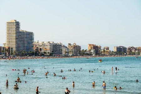 VALENCIA, SPAIN - JULY 28, 2016: People Having Fun In Water And Relaxing In Peniscola Beach Resort At Mediterranean Sea In Spain.のeditorial素材