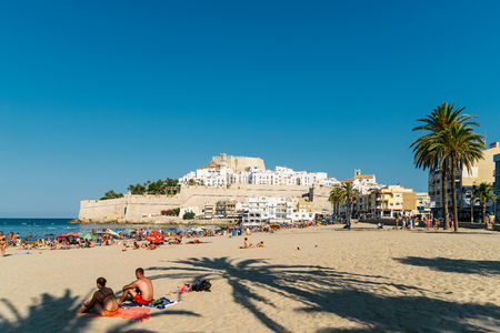 VALENCIA, SPAIN - JULY 28, 2016: People Having Fun In Water And Relaxing In Peniscola Beach Resort At Mediterranean Sea In Spain.のeditorial素材