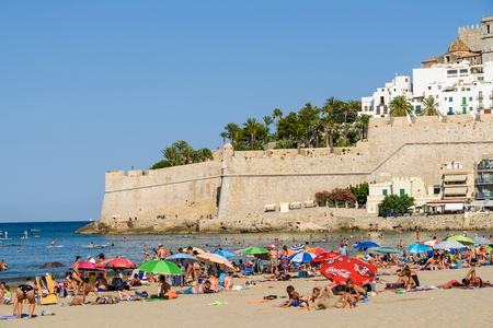 VALENCIA, SPAIN - JULY 28, 2016: People Having Fun In Water And Relaxing In Peniscola Beach Resort At Mediterranean Sea In Spain.のeditorial素材