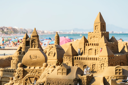 VALENCIA, SPAIN - JULY 28, 2016: Sand Castle Building On Peniscola Beach Resort At Mediterranean Sea.のeditorial素材