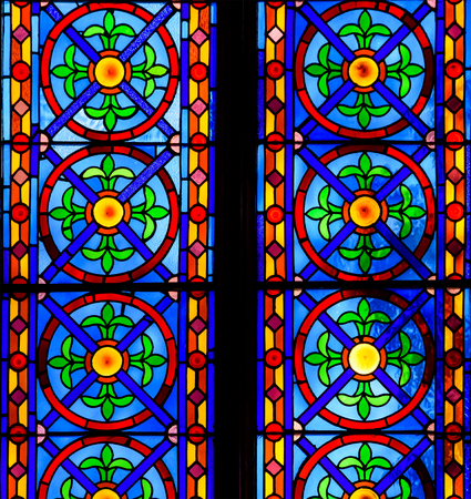 VALENCIA, SPAIN - JULY 24, 2016: Colorful Church Stained Glass Against Light In The Metropolitan Cathedral Basilica of the Assumption of Our Lady of Valencia.のeditorial素材
