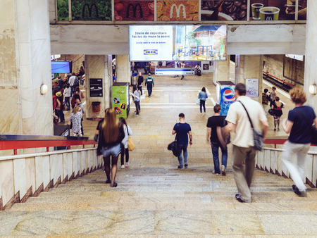 BUCHAREST, ROMANIA - MAY 06, 2015: People Waking In Tunnel Underground Metro For Subway Station Transfer.のeditorial素材