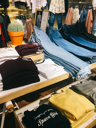 BUCHAREST, ROMANIA - MARCH 12, 2017: Modern Woman Clothes For Sale In Fashion Store.のeditorial素材
