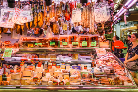 BARCELONA, SPAIN - AUGUST 05, 2016: Meat, Cheese and Dairy Products For Sale In Santa Catarina Market Of Barcelona City.のeditorial素材