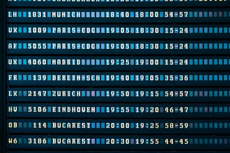 Flight Departure And Arrivals Of Planes Information Board In Airport Terminal